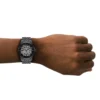 emporio-armani-ar60093-montre-automatique-noire-poignet-homme.webp Emporio Armani AR60093 Antonio – Montre homme automatique skeleton noire