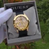 guess-gw0109l1-montre-doree-ecrin-original.webp GUESS GW0109L1 Clarity – Montre femme dorée à cristaux baguette