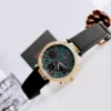 Guess GW0113L1 Solstice montre femme dorée avec cadran vert et bracelet silicone noir