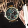guess-gw0113l1-solstice-cadran-vert-cristaux-detail-femme-au-maroc.webp Guess GW0113L1 Solstice montre femme dorée avec cadran vert et bracelet silicone noir