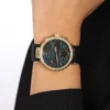guess-gw0113l1-solstice-montre-portee-bracelet-noir-femme-au-maroc.webp Guess GW0113L1 Solstice montre femme dorée avec cadran vert et bracelet silicone noir