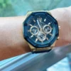 guess-gw0263g1-momentum-montre-portee-bracelet-noir-homme-au-maroc.webp Guess GW0263G1 Momentum montre homme dorée avec cadran noir et bracelet silicone noir