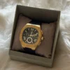 Guess GW0571G3 Headline montre homme en acier doré avec cadran vert et bracelet silicone noir