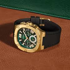 Guess GW0571G3 Headline montre homme en acier doré avec cadran vert et bracelet silicone noir
