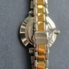 michael-kors-mk1041-pyper-dos-boitier-fermoir.webp Michael Kors MK1041 Pyper – Montre femme bicolore pavée