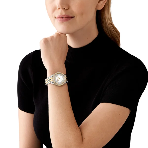 michael-kors-mk4811-poignet-femme.webp Michael Kors MK4811 Harlowe – Montre femme bicolore pavée