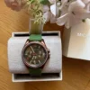 michael-kors-mk7421-mini-pilot-montre-femme-coffret-maroc-casablanca.webp Michael Kors MK7421 Mini Pilot – Montre Femme Verte et Rose Gold
