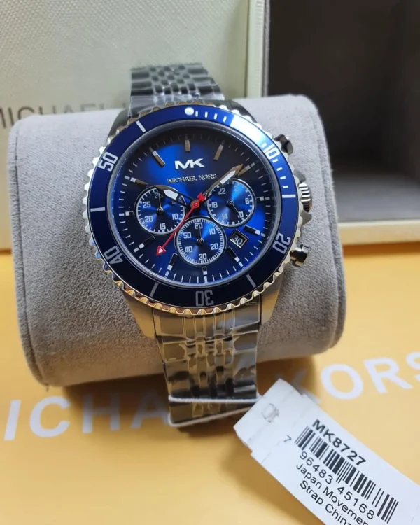 michael-kors-mk8727-montre-homme-detail-cadran-bleu-chronographe.webp MICHAEL KORS Bayville MK8727 Montre Homme Chronographe Bleu