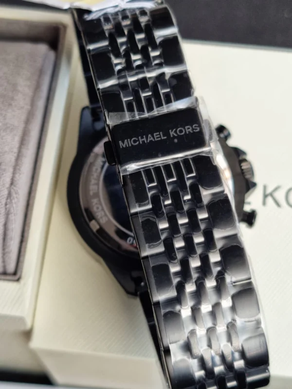 michael-kors-mk8750-montre-homme-bracelet-acier-noir-detail.webp MICHAEL KORS Bayville MK8750 Montre Homme Chronographe Noire