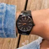 montre-michael-kors-mk6625-femme-cadran-noir-acier-noir-portee.webp Montre Femme Michael Kors MK6625 Channing Acier Noir Cadran Pailleté