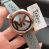montre-michael-kors-mk7314-maroc-authentique-etiquette.png Michael Kors Janelle MK7314 – Or Rose Bracelet Silicone Gris (MK7314)