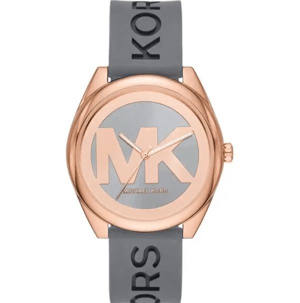 montre-michael-kors-mk7314-maroc-cadran-logo-mk.png Michael Kors Janelle MK7314 – Or Rose Bracelet Silicone Gris (MK7314)