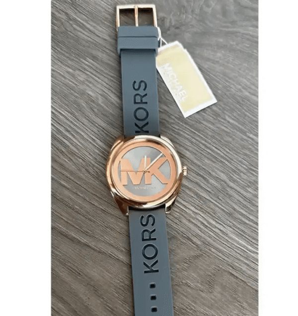 montre-michael-kors-mk7314-maroc-or-rose-cadran.png Michael Kors Janelle MK7314 – Or Rose Bracelet Silicone Gris (MK7314)